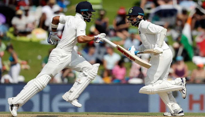 Cricket Batters Running Between Wickets